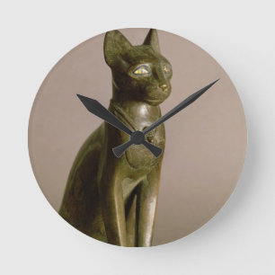 Statuette einer Katze, welche die Göttin Bastet Runde Wanduhr