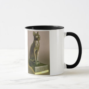 Statuette einer Katze, welche die Göttin Bastet Tasse