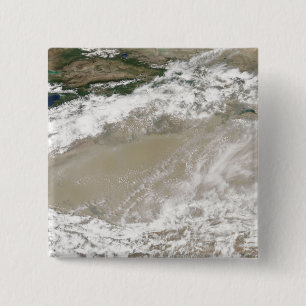 Staub und Wolken schwebten über dem Taklimakan DE Button