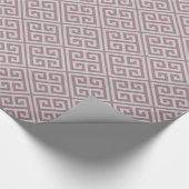 Staubiges malvenfarbenes griechisches geschenkpapier (Ecke)