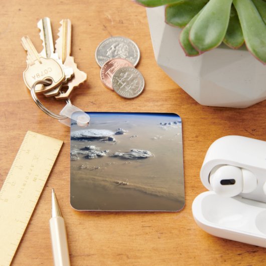 Staubsturm über die Sandmeere der Wüste Sahara. Schlüsselanhänger (Schreibtisch)