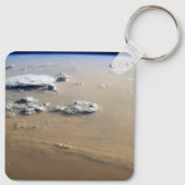 Staubsturm über die Sandmeere der Wüste Sahara. Schlüsselanhänger (Rückseite)