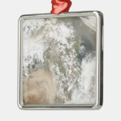 Staubstürme im Nahen Osten Silbernes Ornament (Links)