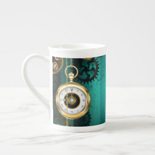 Steampunk-Schmuck Uhr auf grünem Hintergrund Porzellantasse