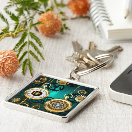 Steampunk-Schmuckschau auf grünem Hintergrund Schlüsselanhänger (Seite)