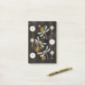 Steampunkdrachenfliegen auf braunem, gestreiften H Post-it Klebezettel (Auf Schreibtisch)