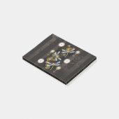 Steampunkdrachenfliegen auf braunem, gestreiften H Post-it Klebezettel (angewinkelt)