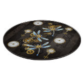 Steampunkdrachenfliegen auf braunem, gestreiften H Schneidebrett (Ecke)