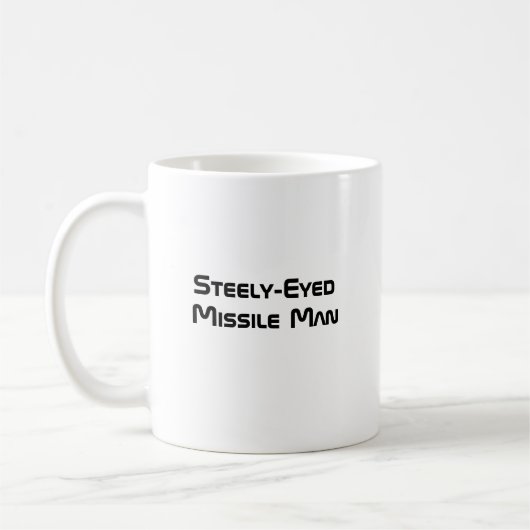 Steely-Mit Augen Missile Man Kaffeetasse (Links)
