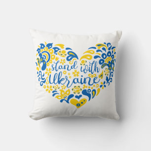 Stehen Sie mit ukrainischer Schrift und Herz Kissen