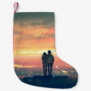 stehendes junges Paar auf dem Dach mit Blick auf c Kleiner Weihnachtsstrumpf