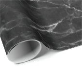 Stein aus schwarzem Marmor mit grau Geschenkpapier (Rolleneckpunkt)