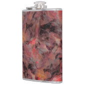 Steine in roten Farbtönen auf schwarz-grauem Hinte Flachmann (Links)