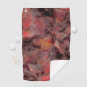 Steine in roten Farbtönen auf schwarz-grauem Hinte Golfhandtuch (Insitu)