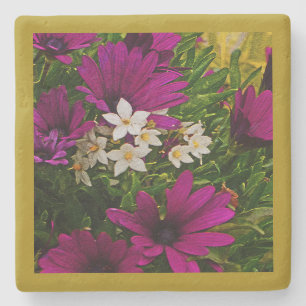 STEINER UNTERSETZER MIT MAGENTA UND WEISSEN BLUME
