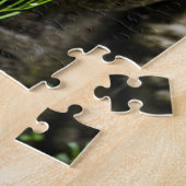 Steingartenstatue mit Blume Puzzle (Seite)