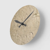 Stela depicting Ramesses II offering incense to hi Runde Wanduhr (Winkel)