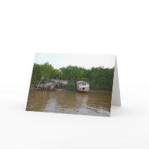 Stelzehäuser auf dem Amazonas