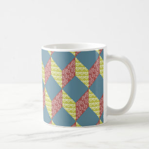 Steppdecken-Baby-Block-Muster in den Retro Farben Kaffeetasse