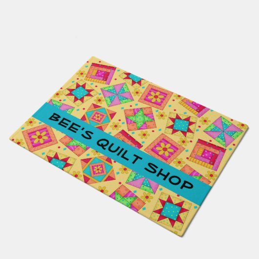 Steppdecken-Patchwork blockiert schwarzen Fußmatte (Schrägansicht)