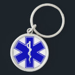 Stern des Lebens Schlüsselanhänger<br><div class="desc">Der Stern des Lebens ist ein Symbol, das die sechs Hauptaufgaben darstellt, die von EMS-Personal durchgeführt werden: Früherkennung, früher Bericht, frühe Antwort, auf Szenen-Sorgfalt, Sorgfalt bei dem Transport und Übertragung auf endgültige Sorgfalt. Ritt von Asclepius, ist ein altes Symbol, das mit dem griechischen Gott Asclepius verbunden ist (ein Praktiker von...</div>