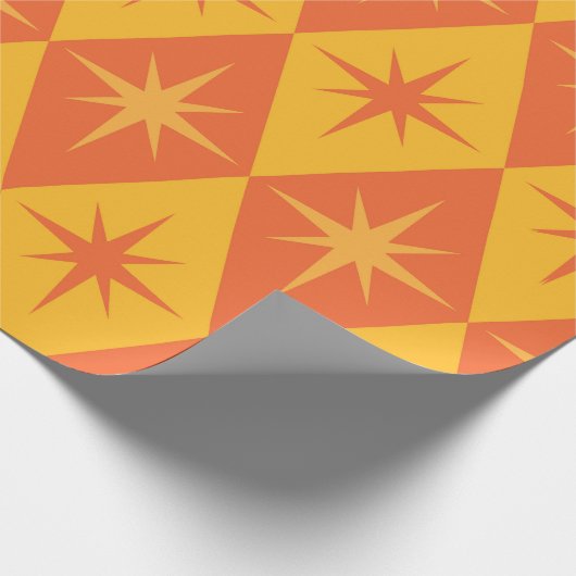 Sternexplosionen aus dem Mittelalter auf orangefar Geschenkpapier (Ecke)