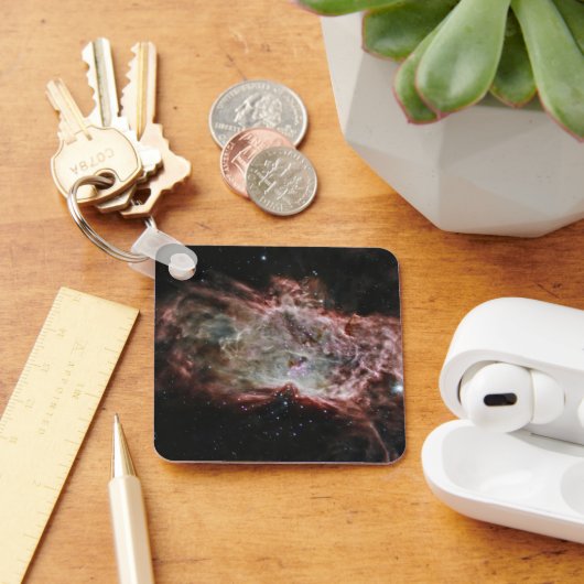 Sternhaufen im Zentrum des Flammennebels. Schlüsselanhänger (Schreibtisch)