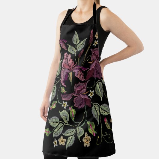 Stickereier Lila Irisschwarzer Hintergrund. Schürze (InSitu)