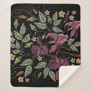 Stickereier Lila Irisschwarzer Hintergrund. Sherpadecke