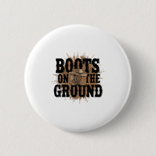 Stiefel auf dem Western Cowboy Rodeo Land Button