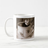 Stiefel in einem Teecup Kaffeetasse (Links)