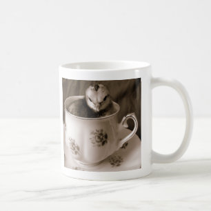 Stiefel in einem Teecup Kaffeetasse