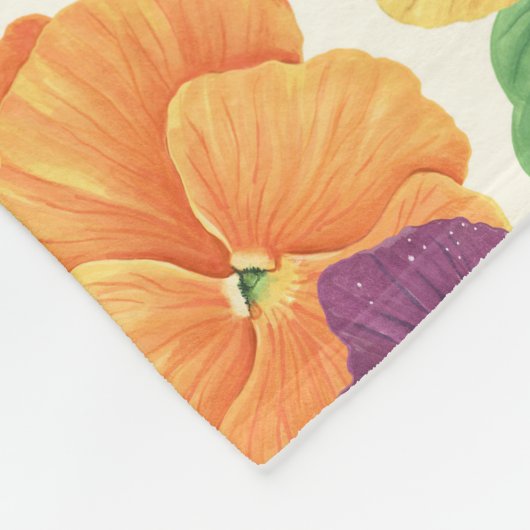 Stiefmütterchen auf weißlich fleecedecke (Ecke)