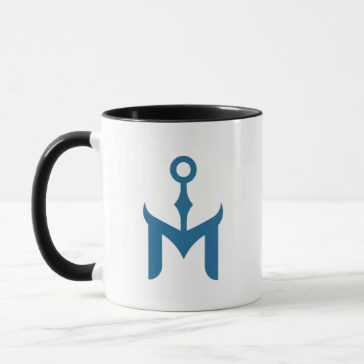 Stilisierter blauer Anker und Buchstabe M Tasse (Links)