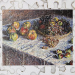 Stillleben mit Äpfeln und Trauben von Claude Monet Puzzle<br><div class="desc">Stillleben mit Äpfeln und Trauben (1880) von Claude Monet ist ein Vintages impressionistisches Kunstwerk, das noch lebendig ist. Verschiedene Früchte in einem Korb auf einem Tisch, einschließlich Äpfel und Trauben Set für den Erntedank zu Abend. Über den Künstler: Claude Monet (1840-1926) war Gründer der französischen impressionistischen Malerei, wobei die meisten...</div>