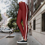 Stilvolle Burgunder Leggings mit weißem Streifen<br><div class="desc">Mit diesen eleganten Burgunder Leggings, die mit einem knalligen, weißen Streifen auf beiden Seiten für sportliche und moderne Anziehungskraft gestaltet wurden, verleihen Sie Ihrem sportlichen Aussehen eine besondere Note. Ob Sie im Fitnessraum trainieren, sich sportlich betätigen oder einfach nur entspannen möchten, diese Leggings bieten eine perfekte Kombination aus Komfort und...</div>