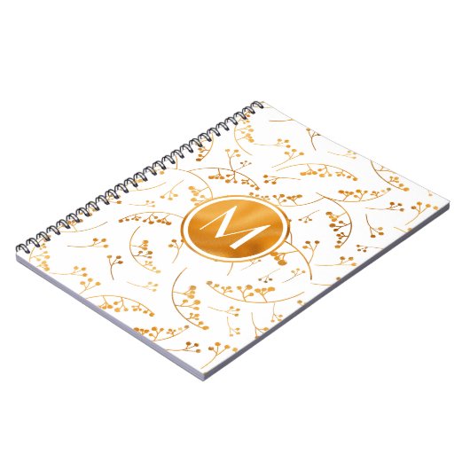 Stilvolle Goldbeeren aus Monogramm auf weißem Notizblock (Linke Seite)