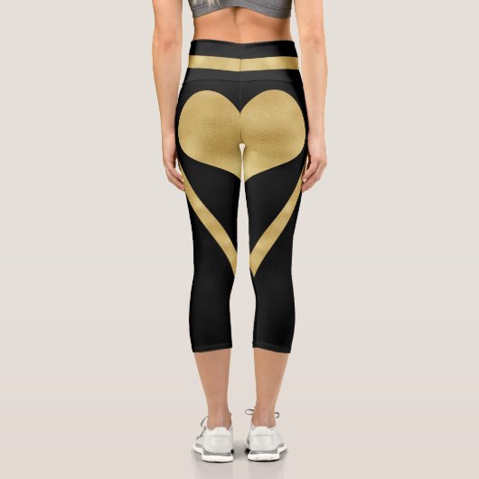 Stilvolle Goldene Herzstreifen auf schwarz Capri Leggings (Rückseite)