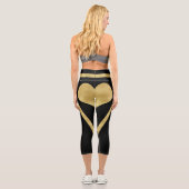 Stilvolle Goldene Herzstreifen auf schwarz Capri Leggings (Rückseite)