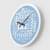 Stilvolle moderne Wanduhr PEACE mehrsprachig (Winkel)