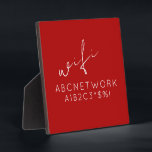 Stilvolle Red WiFi Password Signature Plaque Fotoplatte<br><div class="desc">Behalt deine Gäste mit dieser stilvollen WiFi-Passwort-Schild-Plakette verbunden. Mit seinem feinen roten Hintergrund und der modernen Typografie ist diese Plakette die perfekte Ergänzung zu jeder Zuhause oder jedem Büro. Die 5, 25x5, 25 Größe und die mitgelieferte Erleichterung machen es einfach, in jedem Zimmer anzuzeigen. Füllen Sie einfach Ihr WiFi-Passwort aus...</div>