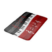 Stilvolle rote Schwarz-weiße Klavier-Schlüssel und Badematte (Schrägansicht)