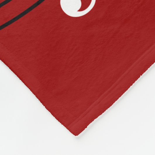 Stilvolle rote Schwarz-weiße Klavier-Schlüssel und Fleecedecke (Ecke)