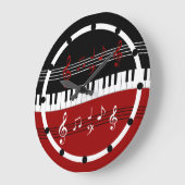 Stilvolle rote Schwarz-weiße Klavier-Schlüssel und Große Wanduhr (Winkel)