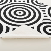 Stilvolle schwarz-weiße Nestkreise Sherpadecke (3/4)