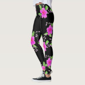 Stilvolle schwarze Leggings mit rosa Blume (Links)
