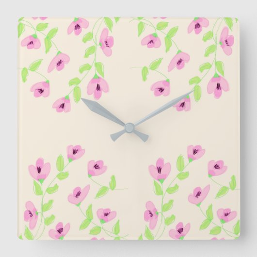 Stilvolle Uhr am Platz mit rosafarbener Blüte (Vorderseite)