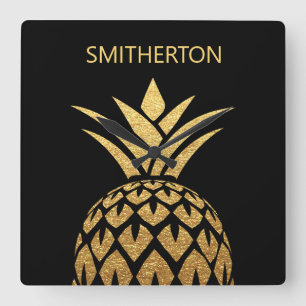 Stilvoller goldener Ananas-Schwarzer Familienname Quadratische Wanduhr