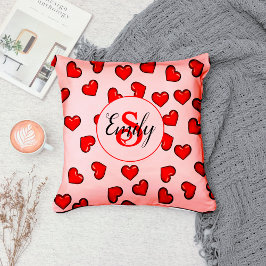 Stilvolles Rotherz-Muster auf rot-rosa monogrammat Kissen
