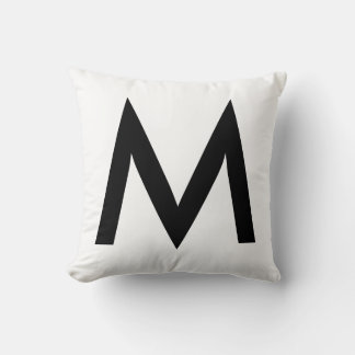 Stilvolles schwarzes Monogramm auf Weiß Kissen